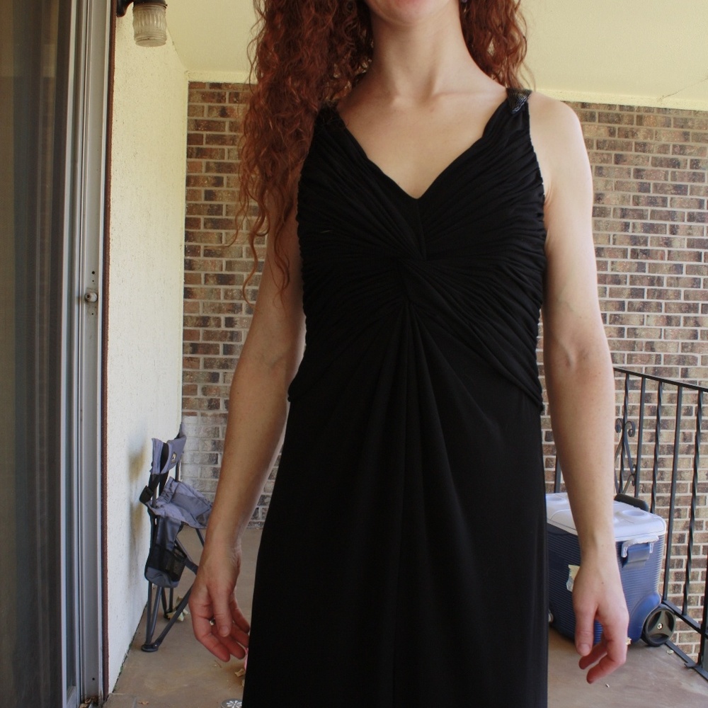 Long, black, sequinned strapped formal dress